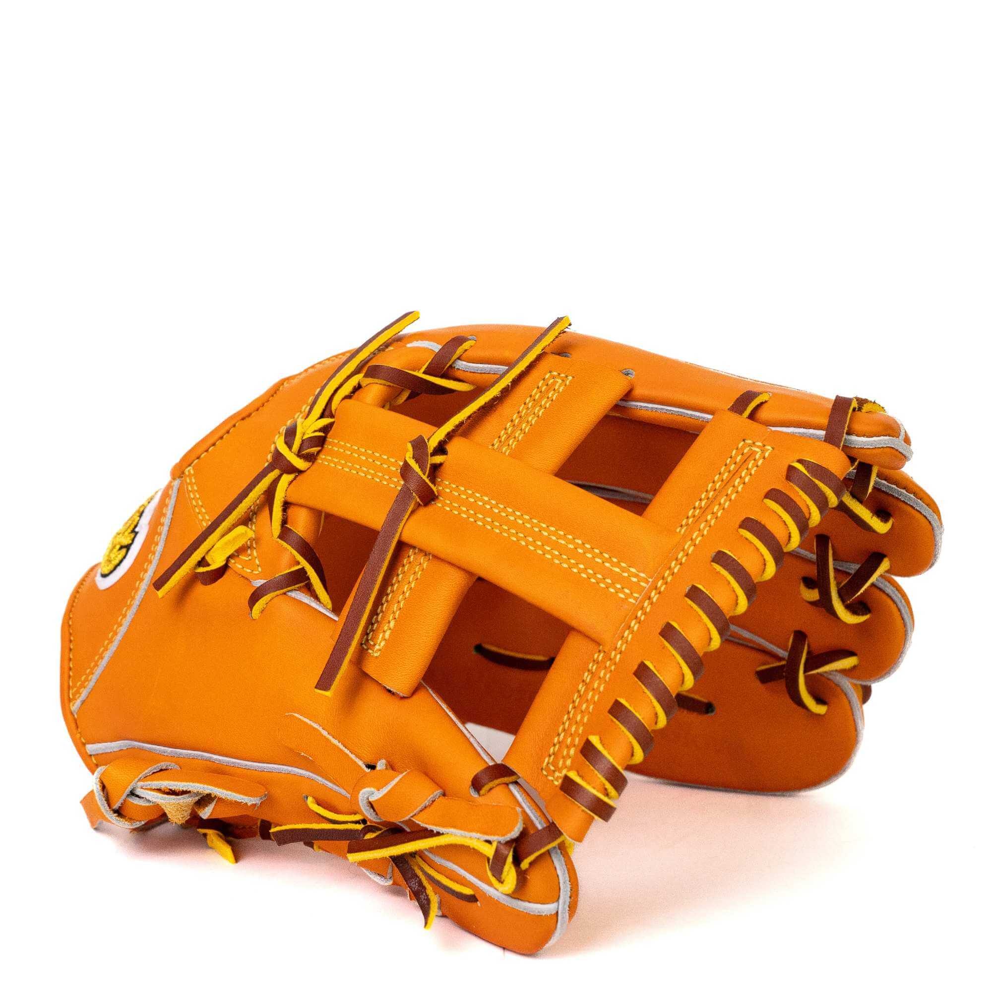 Jax EN-7 infield glove in orange and tan, featuring a single post design for flexibility and precision on the field.