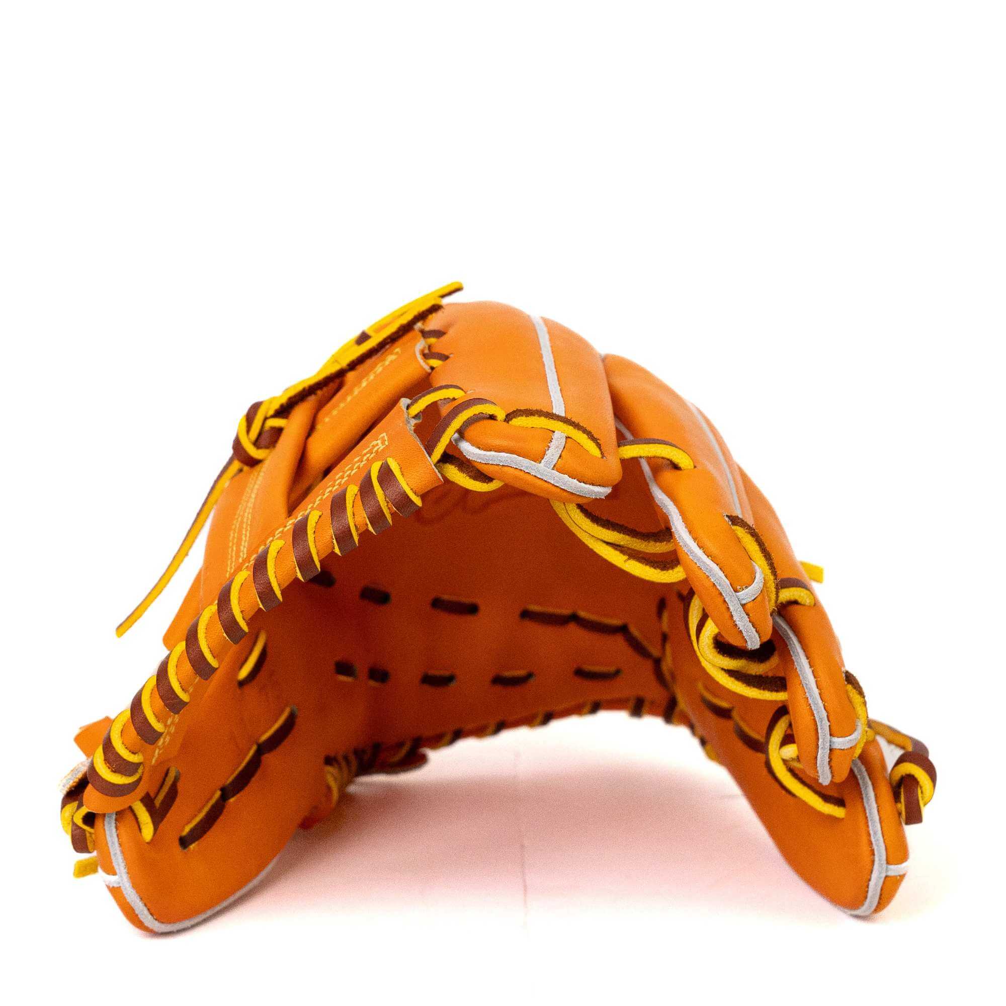 Jax EN-7 infield glove showing deep pocket design in orange and tan, ideal for flexible wear and precision play.