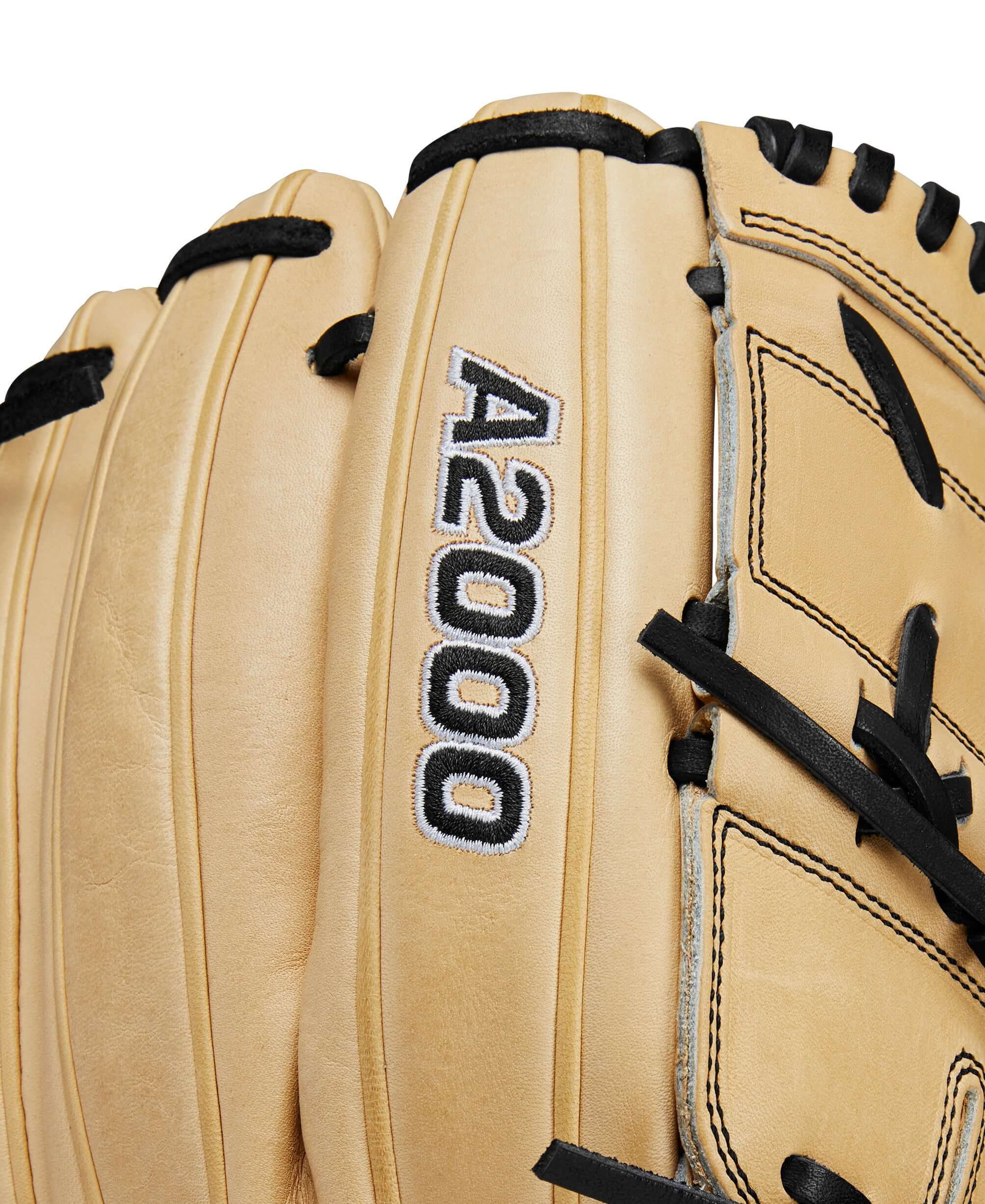 Close-up of Wilson A2000 B2 pitcher's glove showing blonde leather and A2000 logo details.