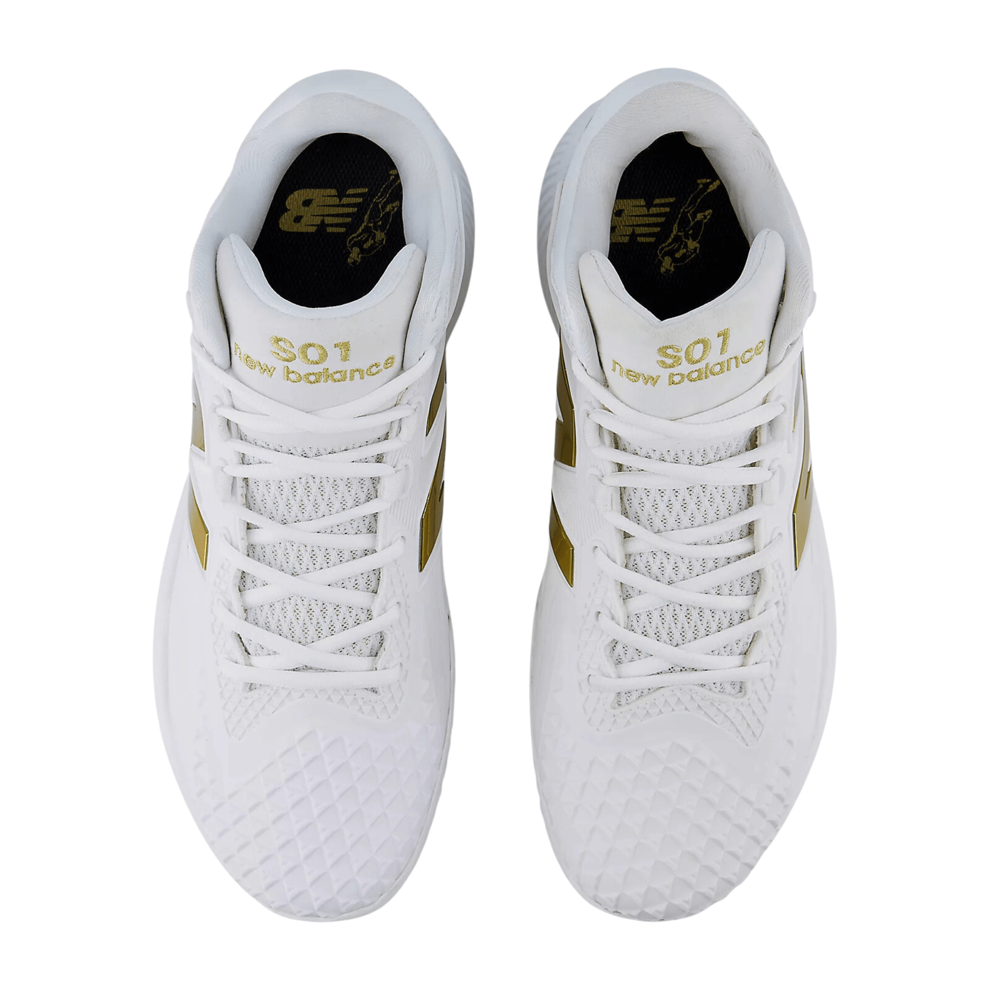 New Balance Shohei TSHOV1 shoes in white with gold accents, featuring a textured upper and sleek design.