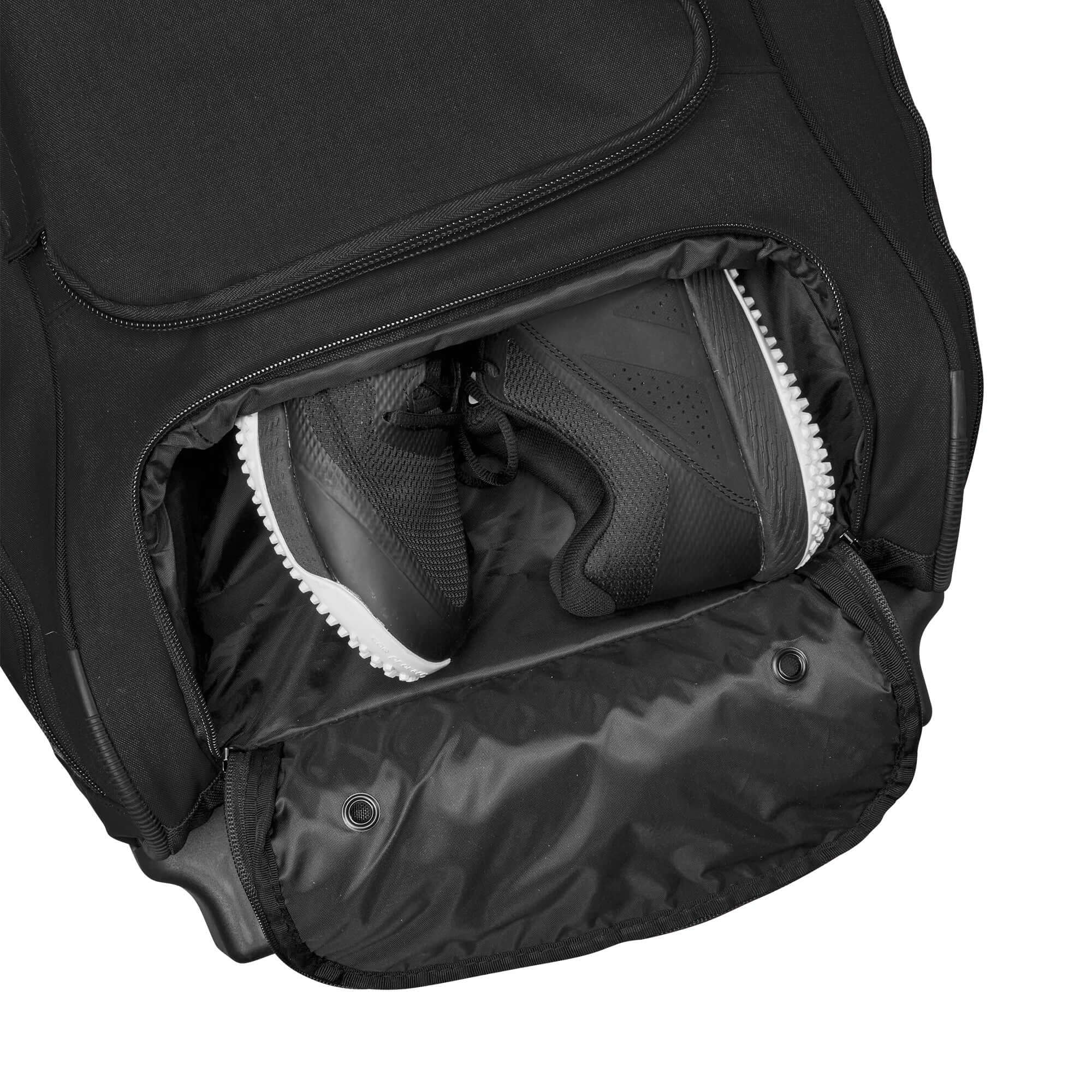 Interior view of Evoshield Stonewall 2.0 Wheeled Bag with vented shoe compartment for storage.