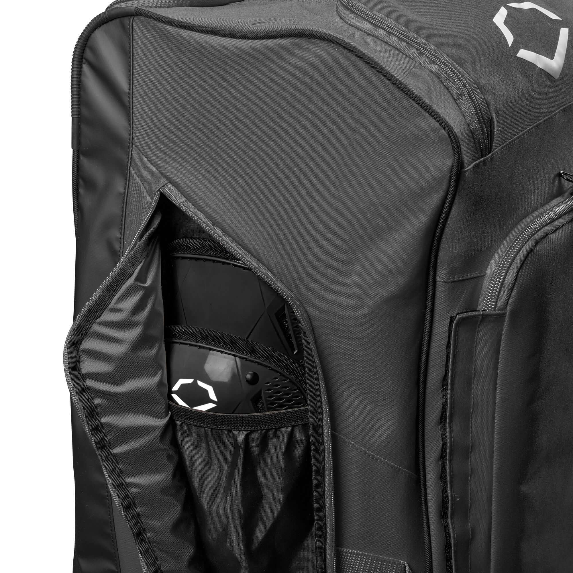 Evoshield Stonewall 2.0 Wheeled Bag side pocket featuring gear storage and durable fabric design.