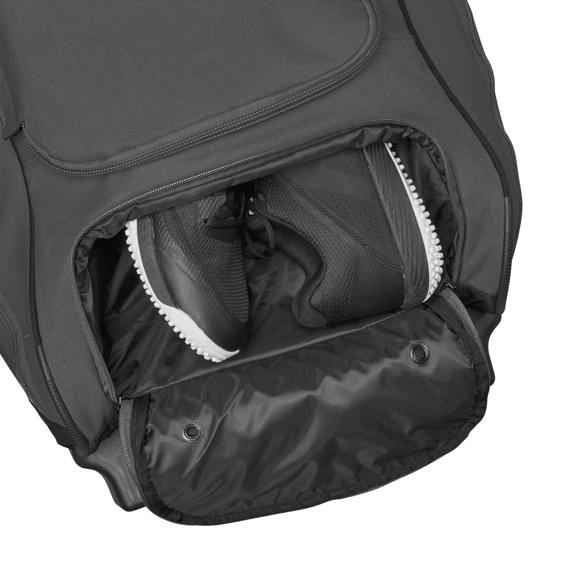 Vented shoe compartment of Evoshield Stonewall 2.0 Wheeled Bag for optimal gear storage and organization.