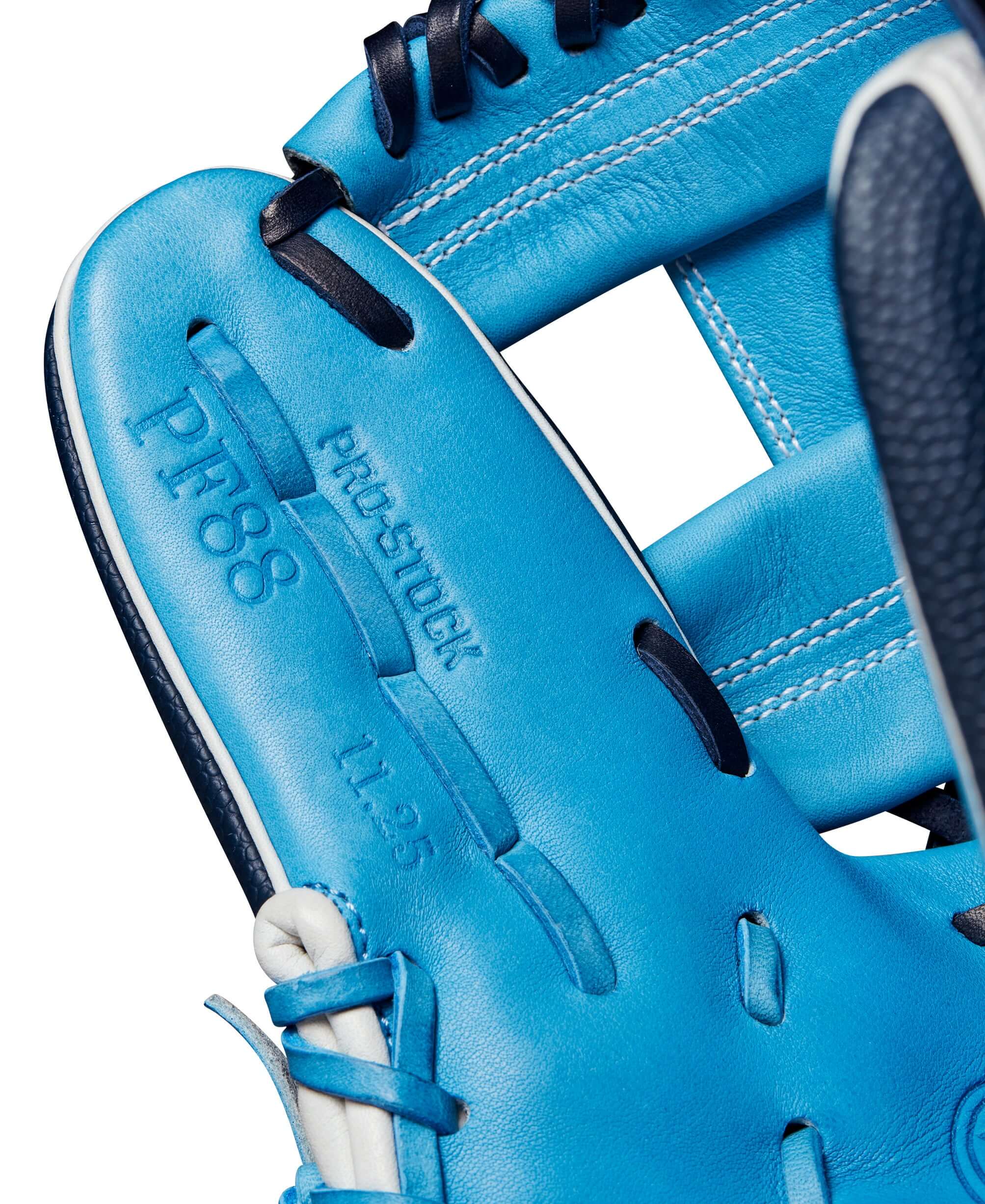 Close-up of Wilson A2000 PF88SS infield baseball glove showing Sky Blue Pro Stock leather details and design features.