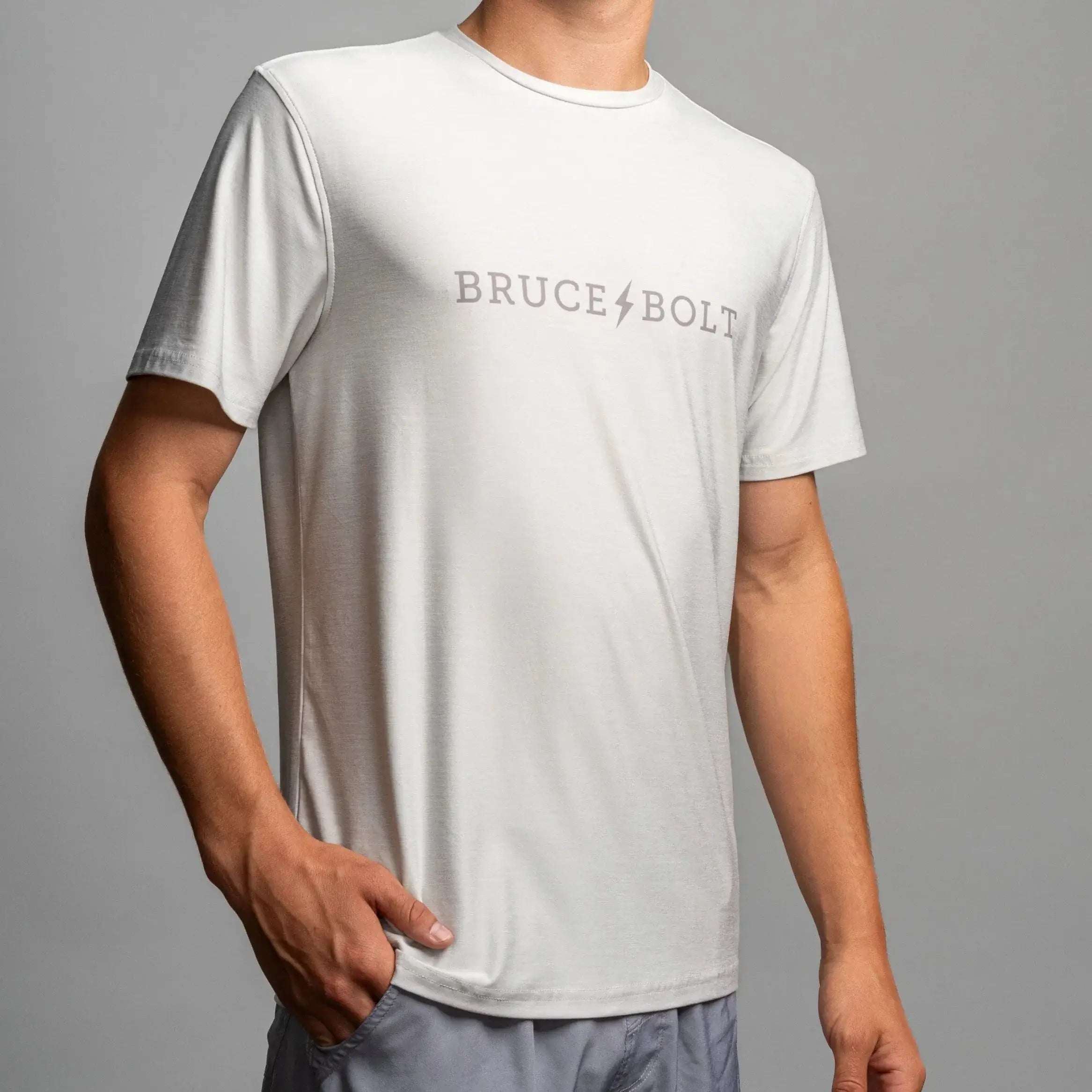 Youth wearing a grey Bruce Bolt SuperSoft T-Shirt, showcasing its comfort and style for active and casual wear.