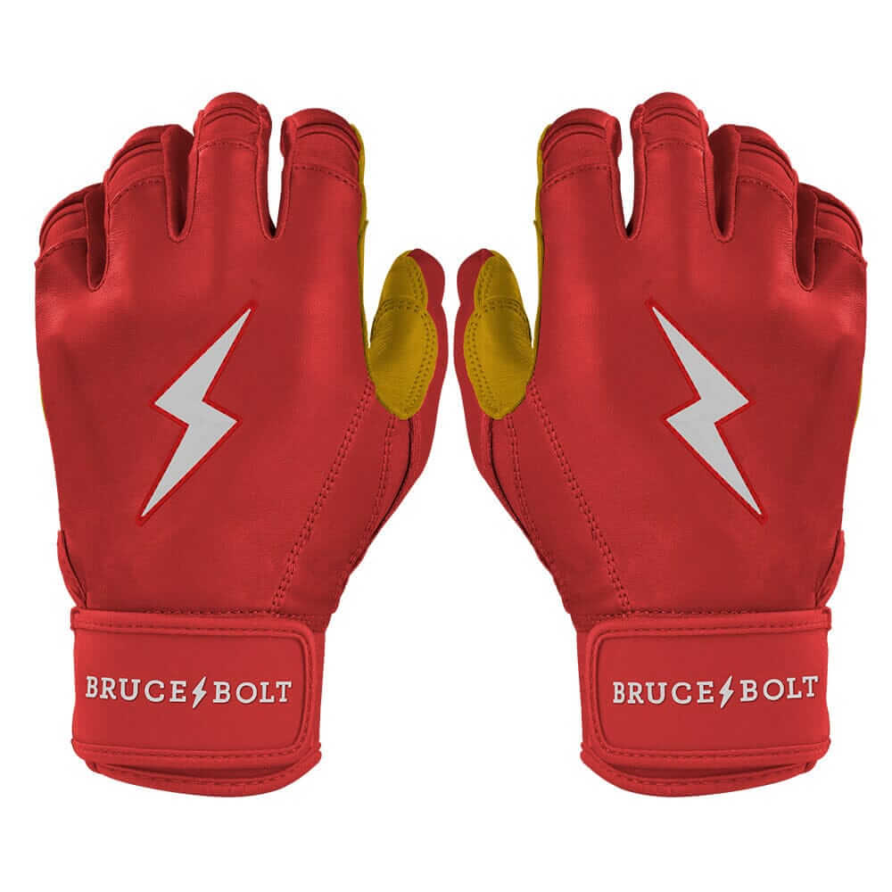 Bruce Bolt Premium Pro Short Cuff Batting Gloves in vibrant red with lightning design, ideal for improved grip and performance.