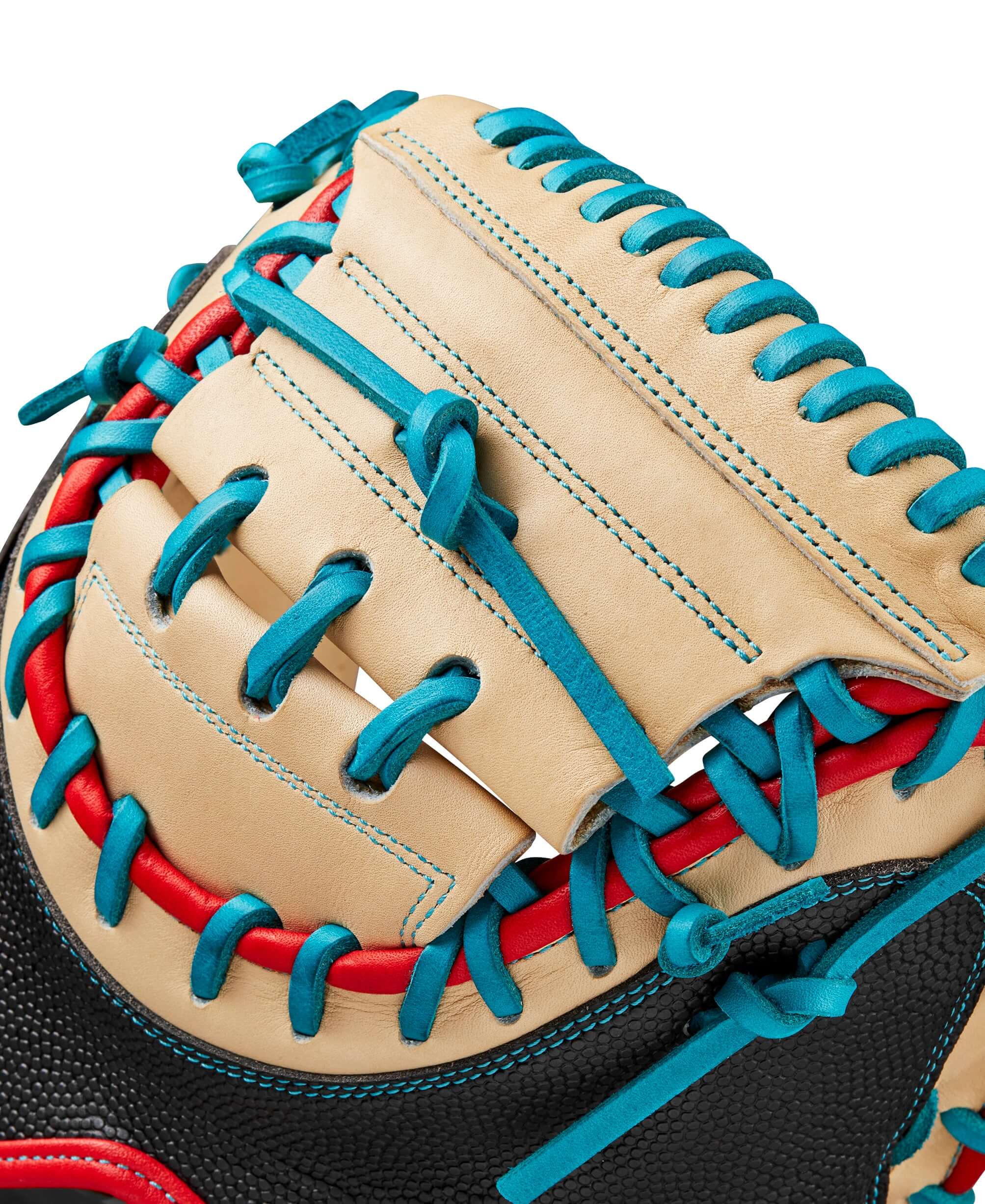 Close-up of Wilson A2000 PF33 baseball catcher's mitt showing Blonde leather, colorful lacing, and Half Moon Web design.