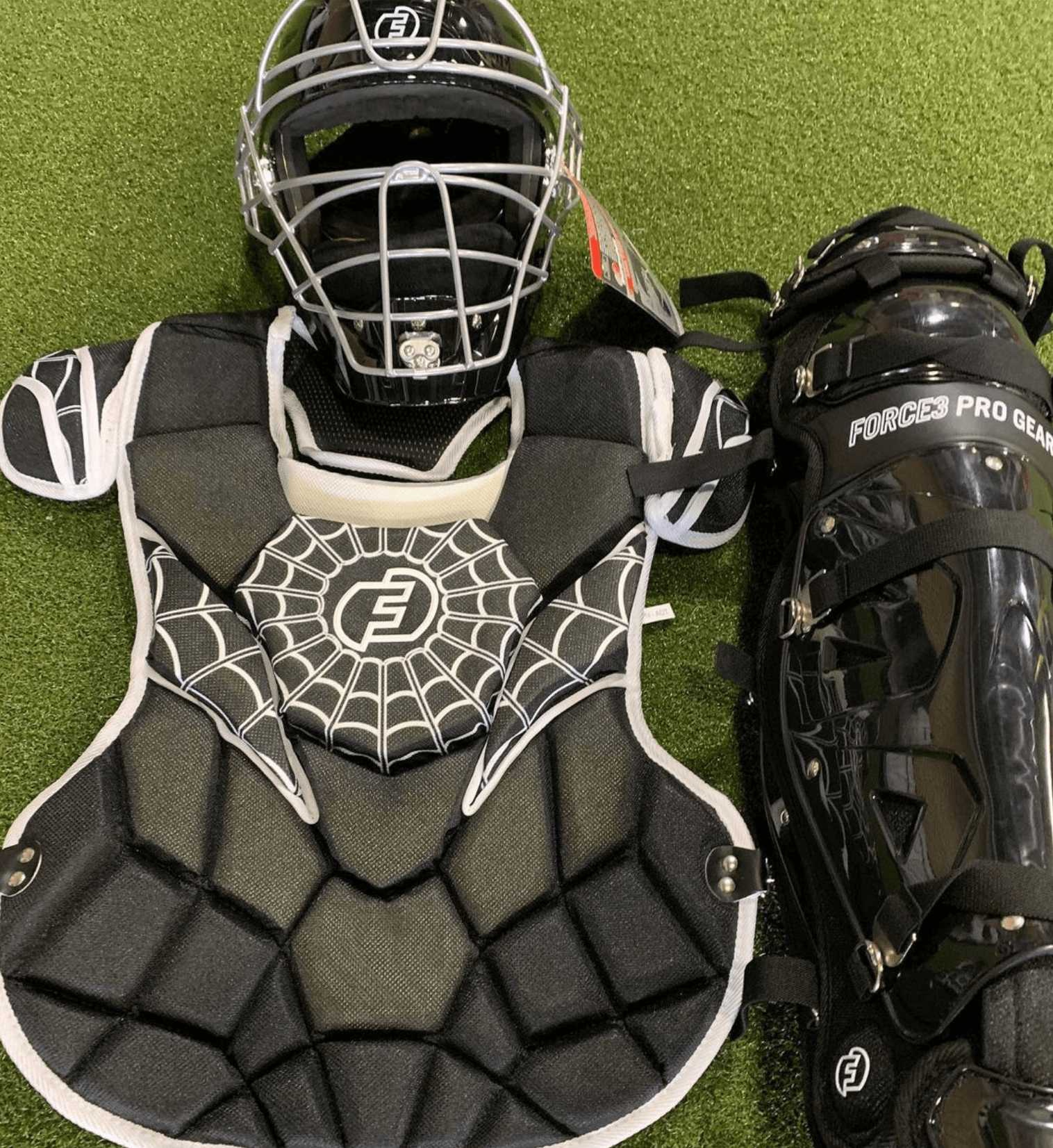 Force 3 Nocsae Catchers Gear Full Set with helmet, chest protector, and leg guards on green turf background.