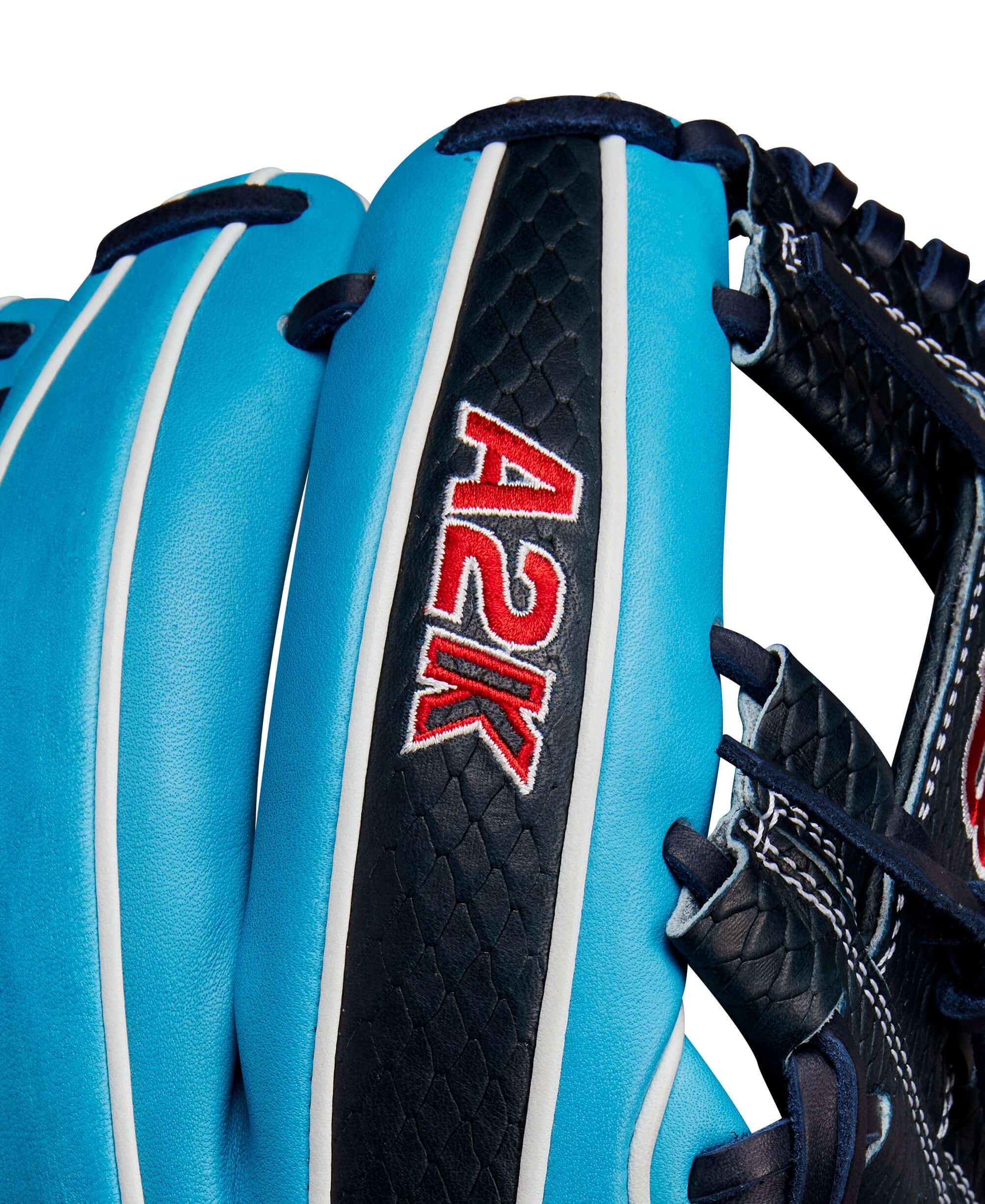 Close-up of Wilson A2K 1786 glove in Tropical Blue and Navy, showcasing detailed stitching and logo.