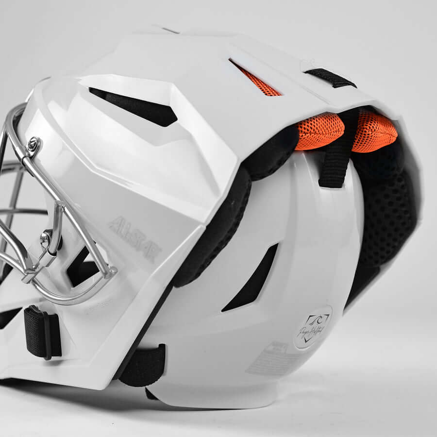 All-Star PHX Fastpitch catchers helmet in white with orange accents, featuring advanced MVP5-PHX technology.