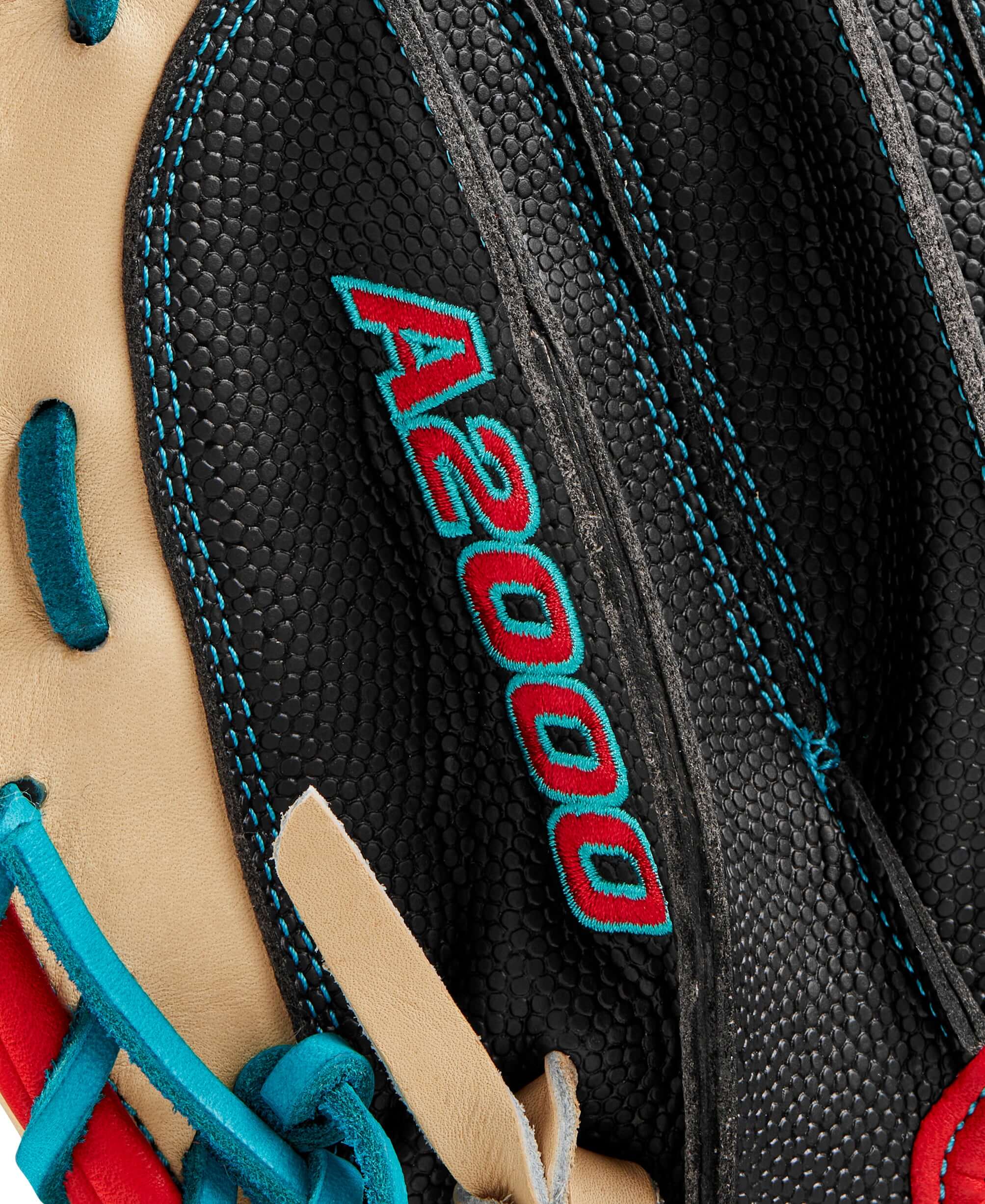 Close-up of Wilson A2000 PF33 baseball catcher's mitt featuring black and blonde leather with turquoise stitching detail.