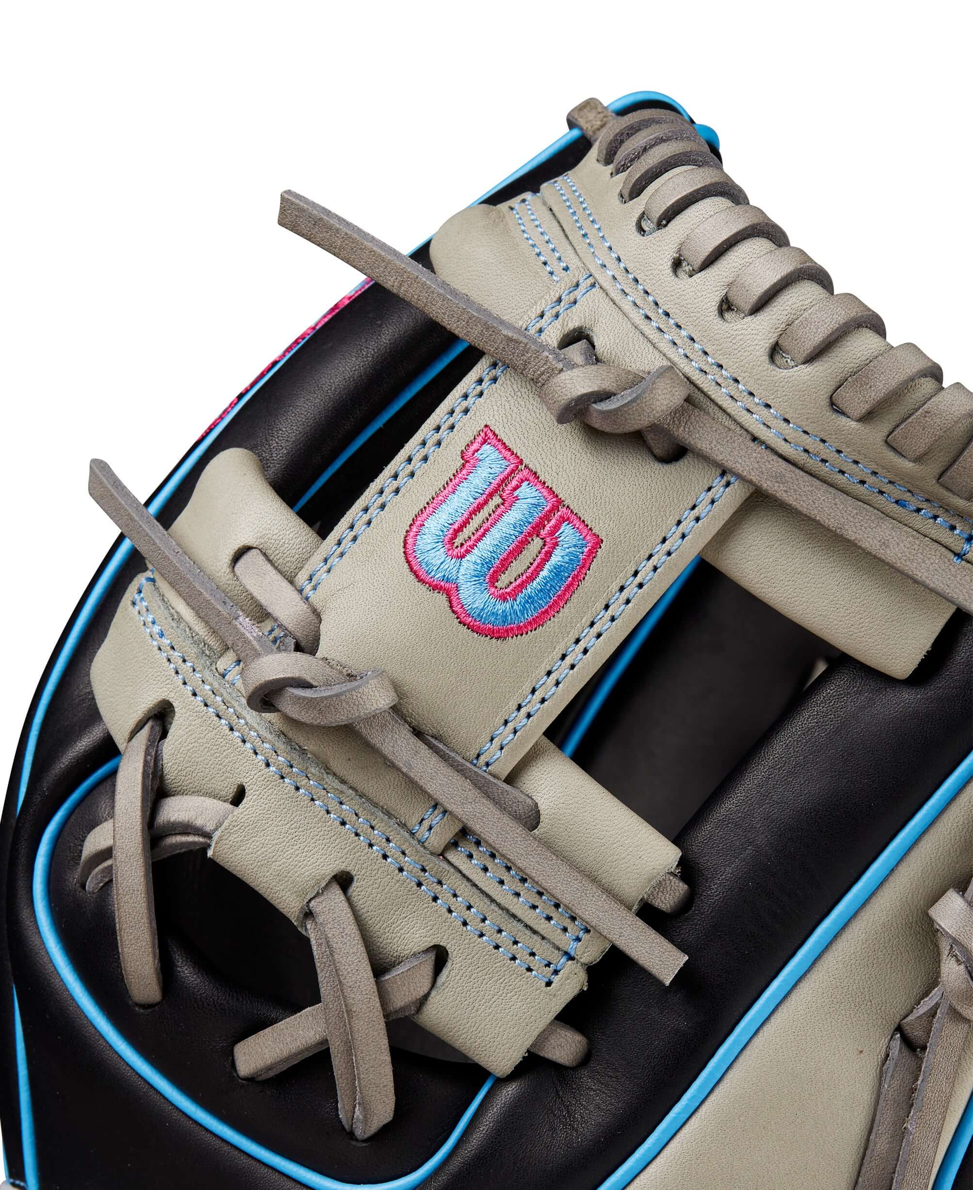 Wilson 2024 A1000 DP15 glove with black, grey, cool blue, and pink details, showcasing full grain leather and H-Web design.