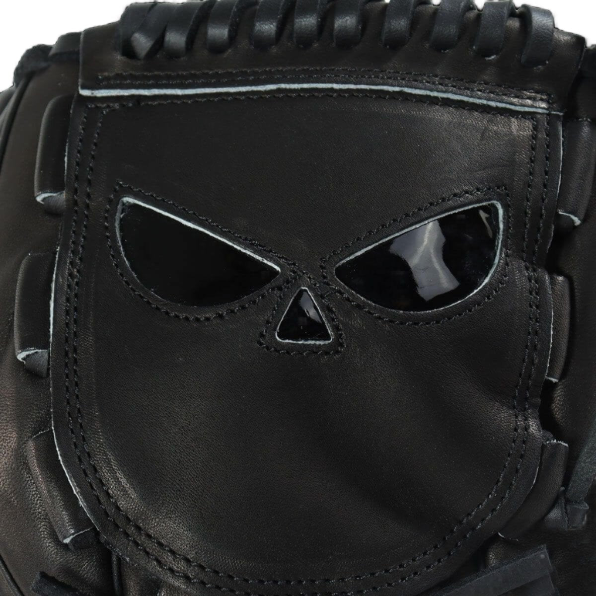 Close-up of the Shadow 5 Stealth 12" RHT glove featuring its intimidating skull logo and premium black leather finish.