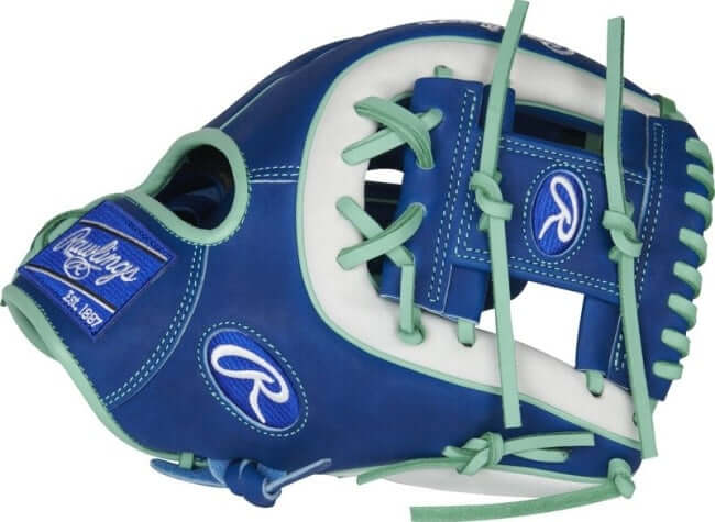 Rawlings Heart of the Hide R2G 11.5-inch I-web glove with mint laces, royal/white design, and ultra-premium steer-hide leather.